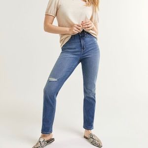 Light wash faux distressed jeans